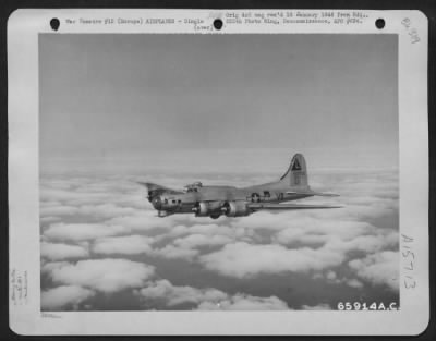 Consolidated > The Boeing B-17 "Flying Fortress" 'Century Note' Part Of The 381St Bomb Group Formation, Wings Its Way Over Fleecy Clouds, En Route To Bomb Enemy Installations In Europe.