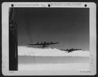 Consolidated > Two Boeing B-17 "Flying Fortress" Part Of The 381St Bomb Group Formation, Roar Toward Their Objective - An Enemy Installation Somewhere In Europe.