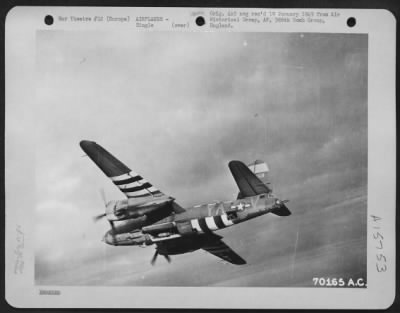 Consolidated > The Martin B-26 'Loretta Young' Of The 386Th Bomb Group Approaches Its Target - An Enemy Installation Somewhere In Europe - With Bomb-Bay Doors Open During A Mission On 1 June 1945.