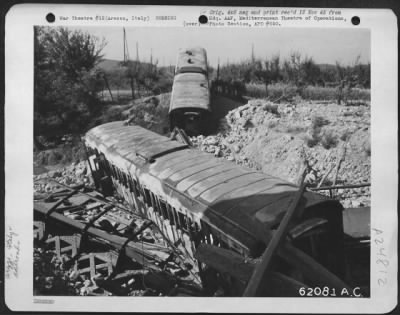 Thumbnail for Consolidated > Bomb Damage To Rail Cars Near Arezzo, Italy.