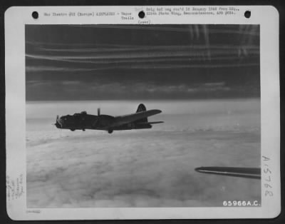 Consolidated > Vapor Trail Footprints Of The Grim Air Battle Over Enemy Occupied Territory Somewhere In Europe Were Left By A Formation Of 381St Bomb Group Planes Which Roared Over A Few Minutes Before The Boeing B-17 'Wolverine'.