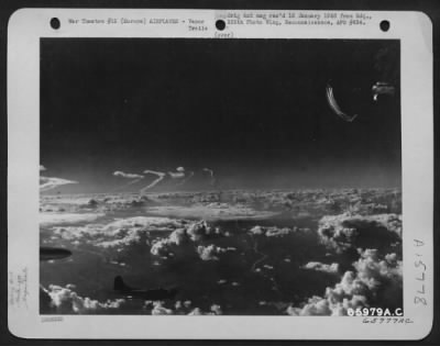 Consolidated > Vapor Trails Left By Boeing B-17 Flying Fortresses Of The 381St Bomb Group Mingle With Clouds As The Planes Fly Toward Their Objective Somewhere In Europe.