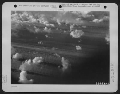 Thumbnail for Consolidated > Boeing B-17 Flying Fortresses Of The 381St Bomb Group Pencil Their Vapor Trails In The Sky As They Roar Toward Their Target, Somewhere In Europe.