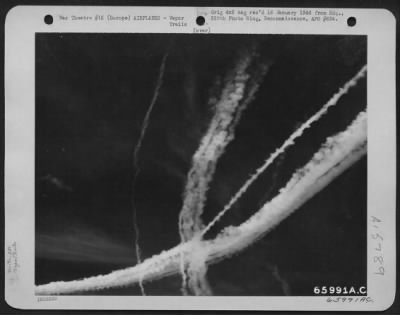 Consolidated > Vapor Trails Left By Boeing B-17 Flying Fortresses Of The 381St Bomb Group And Their Fighter Escort, High Over Europe, Form A Peculiar Pattern.