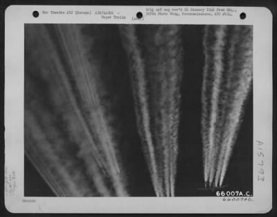 Consolidated > Vapor Trail Footprints Of The Grim Air Battle Over Europe Were Left By A Formation Of 381St Bomb Group Boeing B-17 Flying Fortresses.
