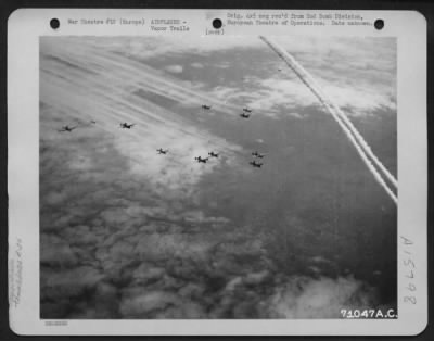 Thumbnail for Consolidated > A Formation Of Consolidated B-24 Liberators Of The 2Nd Bomb Division, Leave A Path Of Vapor Trails As They Wing Their Way To The Target Somewhere In Europe.  24 November 1944.