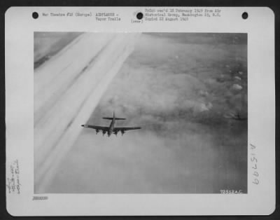 Thumbnail for Consolidated > At An Altitude Of 22,000 Feet Boeing B-17 Flying Fortresses Of The 447Th Bomb Group, Leave A Path Of Vapor Trails As They Drone Through The Sky To Strike Back At The Enemy In Europe.  20 March 1944.