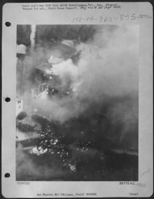 Consolidated > Sparkling Fires Swept Through This Group Of Houses Occupied By German Troops Defending Bologna, Italy, After A Fire Bomb And Strafing Attack By Brazilian Pilots Of The 22Nd Tactical Air Command.  The Fuel Tank Incendiaries Have Destroyed One House And Set