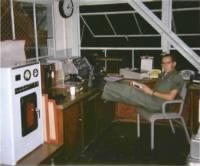 Bill Kover on duty in Control Tower weather observation station.