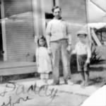 Vic Sr., Joe & Adeline in front of house