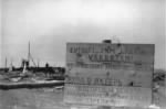 A sign at the entrance to the Maly Trostinets concentration camp warns that trespassers will be shot without warning.jpg