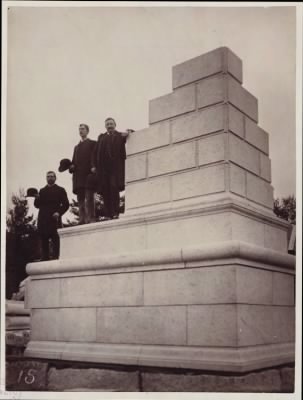 Thumbnail for Trustees' McKim Construction Photos > Councilmen of the City of Boston pose on mock-up of cornerstone for the McKim