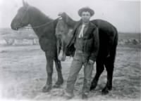 Search Party Member, Samuel S. Miles with his horse -- 1923