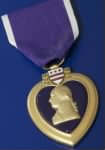 Purple Heart for Injuries sustained in an armed comflict battle.
