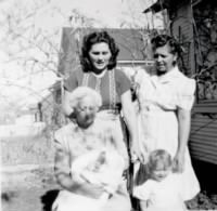063-FH-FAMD-023a (1) Steph & Becky Duncan (2) Flora Miles Duncan (3) Mary Morris Miles (4) Annie Miles -- 4 Generations -- Jul 1949.jpg