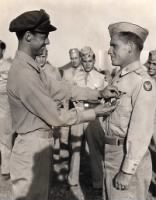 Roland L Greene receiving Air Medal from Col. Frank Kurtz, Italy, 1944
