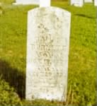 Original tombstone of James M Burnett