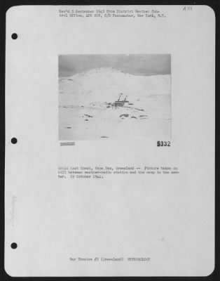 Thumbnail for General > Grnld East Coast, Cape Dan, Greenland -- Picture Taken On Hill Between Weather-Radio Station And The Camp In The Center.  19 October 1944.