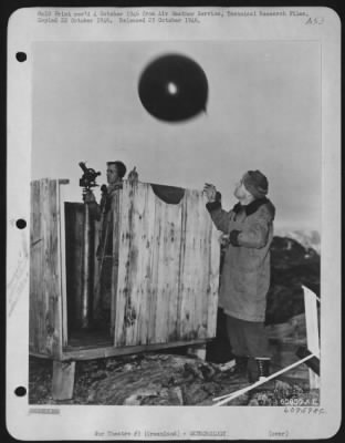 Thumbnail for General > Sgt. Adams And M/Sgt. Trout Releasing Pilot Balloon In Greenland, 1945.