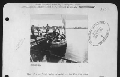 Thumbnail for General > View of a surfboat being unloaded at the floating dock.