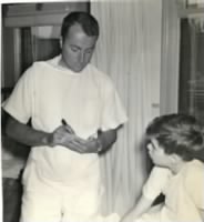 1948, FDH writes prescription during Pediatric Residency, Buffalo Children's Hospital