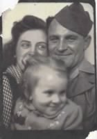 Dad when he was in the service with Mom and Margee