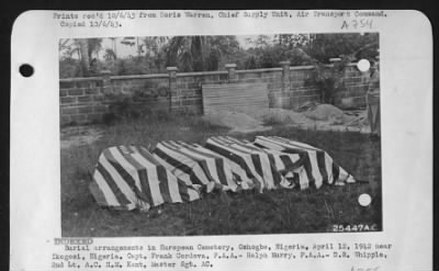 Thumbnail for General > Burial arrangements in European Cemetery, Oshogbo, Nigeria, April 12, 1942 near Ikogosi, Nigeria.  Capt. Frank Cordova, P.A.A. - Ralph Murry, P.A.A. - D.R. Whipple, 2nd Lt. A.C. H.M. Kent, Master Sgt. AC.