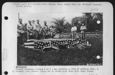 Thumbnail for General > Funeral ceremony. Reading L to R, men standing at foot of coffins: Capt. S. L Gumport, M.C. Gravis, P.A.A. Lt. L. Milch, A.C. Capt. F.P. Glen, P.A.A.