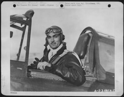 Fighter > 1st Lt. Dallas Clinger, R.F.D., Elno, Wyoming, seated in the cockpit of his plane at a 14th Air force Base in China.