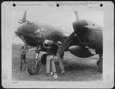 Fighter > The Lockheed P-38 "THE GOLDEN EAGLE" has been doing things to the Japs in the China Theatre of operations, since 1943. It is one of the oldest fighter planes in combat for the 14th Air force. Left to right, are: T/Sgt. V. DeVito of Canton, Ohio