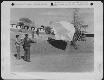 Thumbnail for General > When Men Of The 16Th Combat Camera Unit Examined A Captured Japanese Parachute, They Found That It Was Smaller Than The U.S. Chute And Very Shoddy In Workmanship.  China, February 1944.