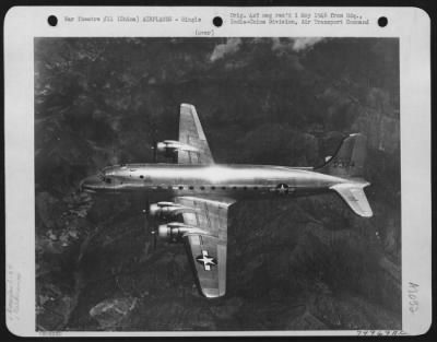 Thumbnail for Douglas > Douglas C-54 "Flying Cross" In Flight Near Kunming, China.  5 June 1945.