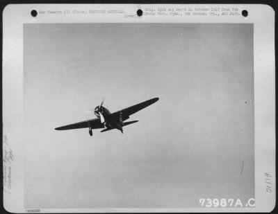 General > Captured Japanese "Zero" In Flight Over An Airfield In China.  February 1943.