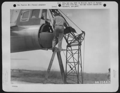 Thumbnail for General > Sgt. Calvin Brown, Kimball, Minn., Covering Tail Guns Of A Boeing B-29 Of The 40Th Bomb Group, Xx Bomber Command, To Keep Them Clean Preparatory For Mission 9 To Anshan, Manchuria.  The Cover Is Removed Just Before The Take-Off.  China.