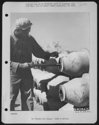 General > Putting The M-14 In The Igniter Of A M-76 500 Pound Incendiary Bomb.