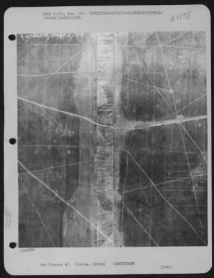 General > This Reconnaissance Photograph Taken On May 16, 1945 Shows Camouflage Painted On The Runway At Linfen Airfield, China.
