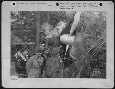 General > A Camouflaged Jap Zero Plane Is Being Inspected Here By Colonel Merian C. Cooper, Left, Brig. Gen. Claire L. Chennault, Right, Commanding General Of The China Air Task Force Of The United States Army Air Force, And Two Other Officers.