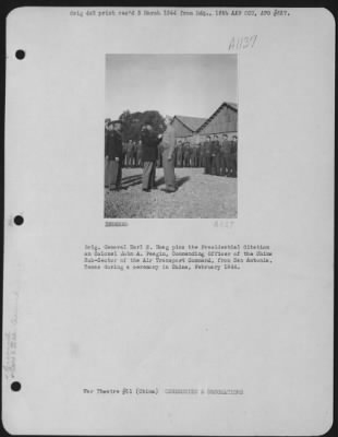 Thumbnail for Awards > Brig. General Earl S. Hoag Pins The Presidential Citation On Colonel John A. Feagin, Commanding Officer Of The China Sub-Sector Of The Air Transport Command, From San Antonia, Texas During A Ceremony In China, February 1944.