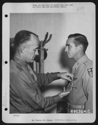 Awards > Captain Claunch Is Awarded The Air Medal At A 14Th Air Force Base In China On 23 November 1945.