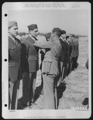 Thumbnail for Awards > 1St. Lt. Mortimer D. Marks Is Presented The Air Medal By Brig. General Claire L. Chennault During A Ceremony At Kumming, China On 16 February 1943.