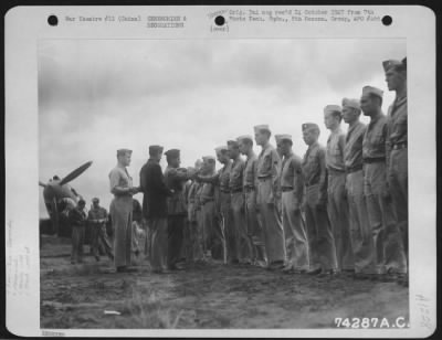 Thumbnail for Awards > Brig. General Claire L. Chennault Presents Awards To Men Of The 11Th Bomb Squadron, 341St Bomb Group, During A Ceremony At Kunming, China.  27 October 1942.