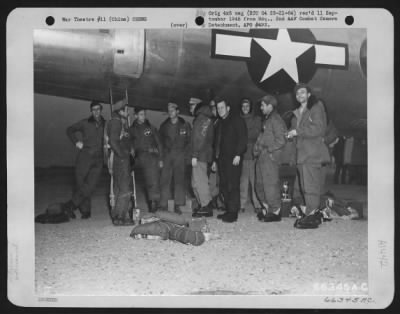 General > Back On The Ground, This Crew Of A Boeing B-29 "Superfortress", Headed By Capt. Linebaugh, Pilot, Finds It Difficult To Settle Down For A Group Picture.  China.