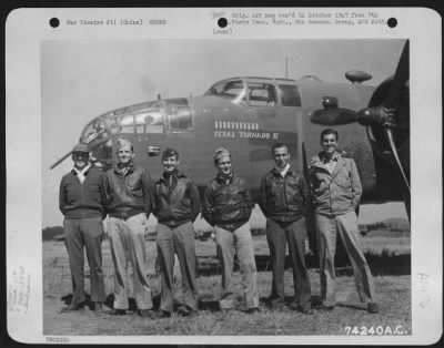 General > A Crew Of The 11Th Bomb Squadron, 341St Bomb Group, Poses Beside Their North American B-25 Plane "Texas Tornado Ii" At An Airfield Somewhere In China, 2 February 1943.