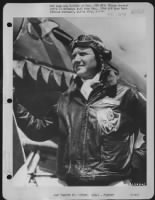 Colonel David 'Tex' Hill Of Hunt, Texas, Air Ace Of The 'Flying Tigers'  Poses Beside His Plane Before Taking Off On A Mission From His Base Somewhere In China.  2 October 1945. - Page 1