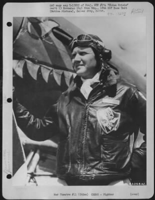 Fighter > Colonel David 'Tex' Hill Of Hunt, Texas, Air Ace Of The 'Flying Tigers'  Poses Beside His Plane Before Taking Off On A Mission From His Base Somewhere In China.  2 October 1945.