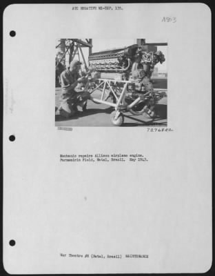 General > Mechanic Repairs Allison Airplane Engine. Parnamirim Field, Natal, Brazil.  May 1943.