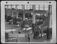 Fuselage Assembly Room Of Aircraft Factory Somewhere In China.  This Factory Was Fitted To Rebuild Curtiss P-40S For The American Volunteer Group And The Chinese Continued The Same Operations For The U.S. Air Force.  1 January 1943. - Page 1