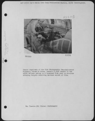 Thumbnail for Cameras > Camera Repairmen Of The 21St Photographic Reconnaissance Sqd., Based In China, Install A K-22 Camera In The Split 24-Inch Set-Up On A Lockheed F-5A Used On Missions Covering Targets Requiring Maximum Amount Of Film.