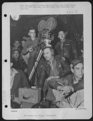 Thumbnail for Motion Pictures > Camera Crew Of The 16Th Combat Camera Unit That Photographed Paulette Goddard'S Personal Appearance At A Base In China On 1 March 1944.  They Are, Left To Right: S/Sgt. A.C. Delucenay, Cameraman; 1St Lt. Lloyd D. Wiler, Sound Recorder; And 1St Lt. Howard