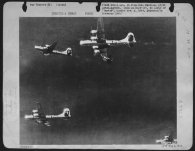 Thumbnail for General > A Japanese Fighter Attack On A Boeing B-29 Formation Over Japan.  Twin-Engined Japanese Fighter (Nick) Scuttles By A Superfort'S Wing (Top Center) During A Head-On Attack.